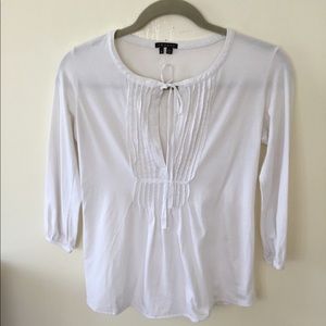 Theory white pull over blouse with tie in front. S